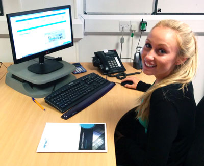 Image of one of our new staff members - Nadia at her desk