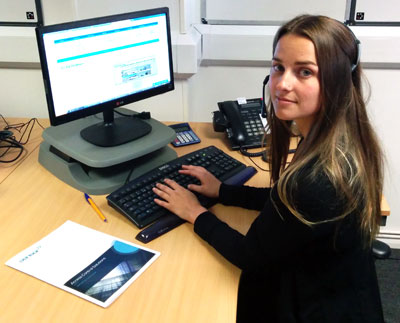 Image of one of our new staff members - Suzi at her desk